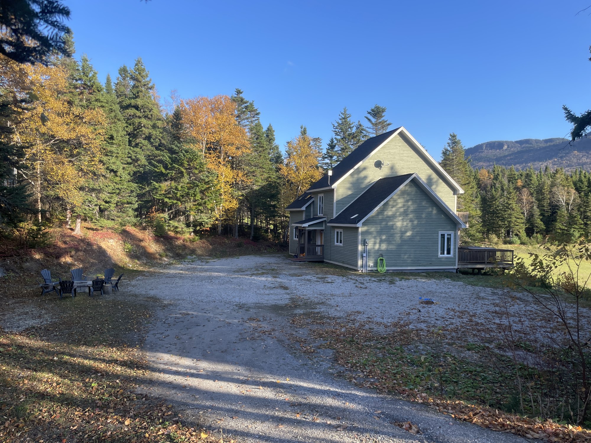 Humber House chalet surrounded by autumn trees